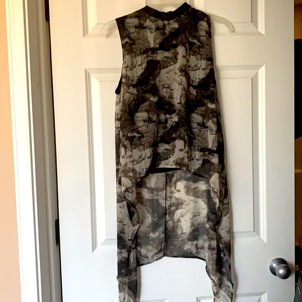 H&M hi-lo blouse and faux leather mini skirt.